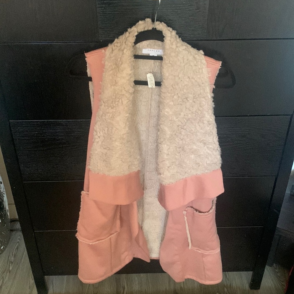 Pink, fluffy soft vest.